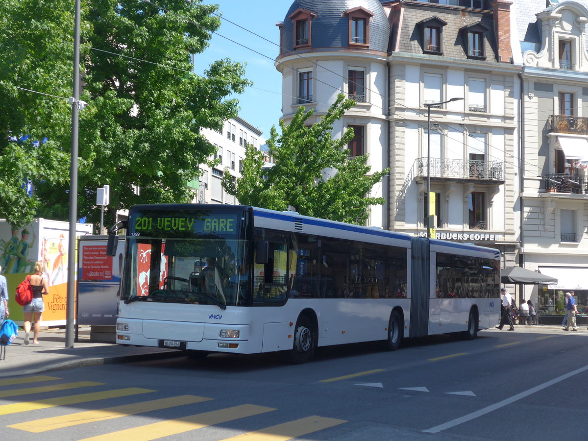 (208'469) - VMCV Clarens - Nr. 906/VD 454'846 - MAN (ex transN, La Chaux-de-Fonds Nr. 243; ex TN Neuch�tel Nr. 243) am 4. August 2019 beim Bahnhof Vevey