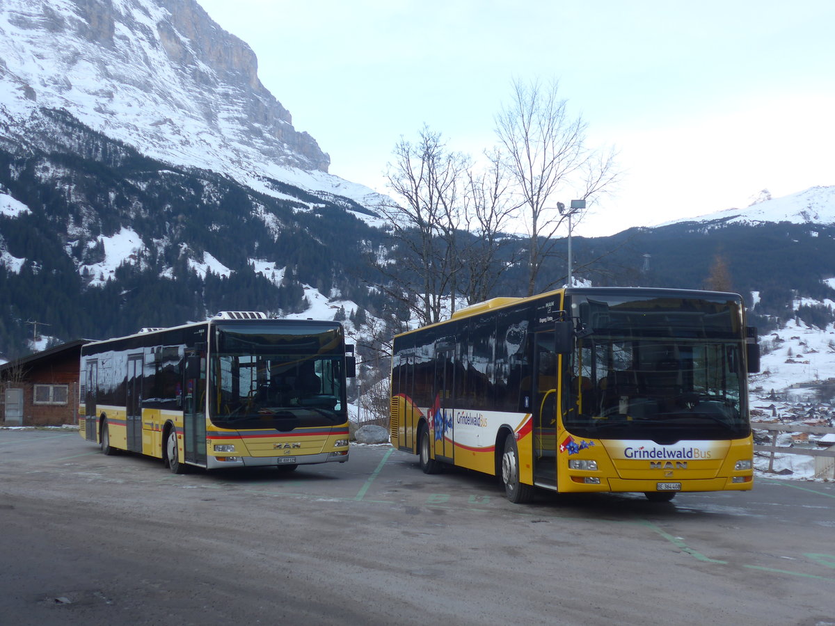 (213'150) - STI Thun - Nr. 129/BE 800'129 - MAN (Einsatz Grindelwald) + Grindelwaldbus, Grindelwald - Nr. 24/BE 364'408 - MAN/G�ppel am 26. Dezember 2019 beim Bahnhof Grindelwald