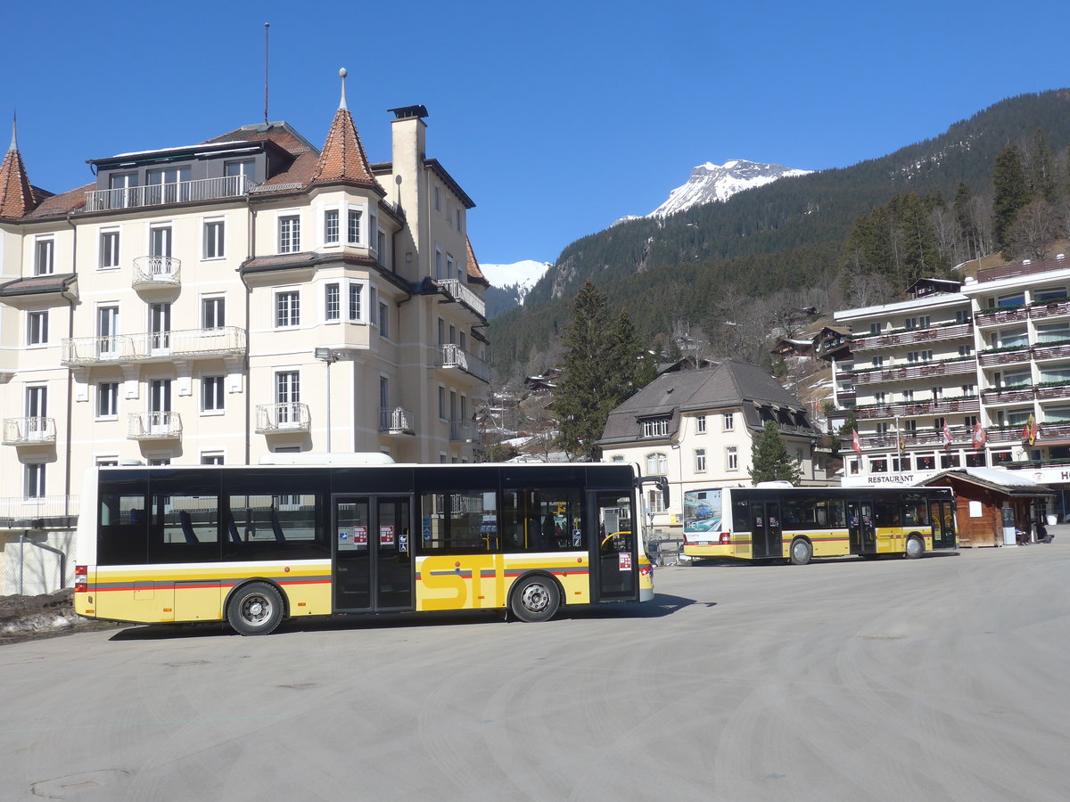 (223'864) - Grindelwaldbus, Grindelwald - Nr. 17/BE 72'444 - MAN/G�ppel (ex STI Thun Nr. 133) + STI Thun - Nr. 129/BE 800'129 - MAN am 28. Februar 2021 beim Bahnhof Grindelwald (Einsatz Grindelwaldbus