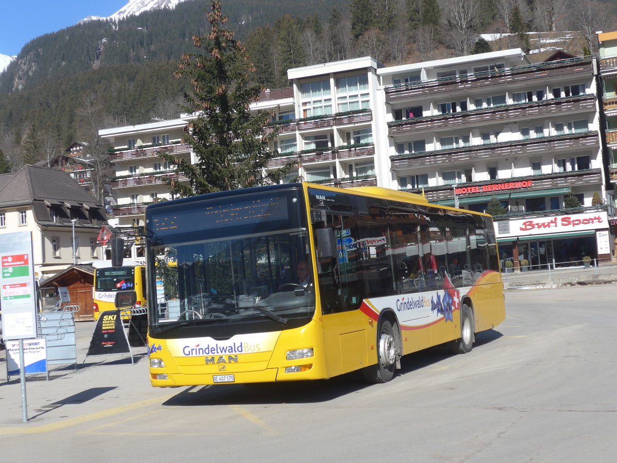(223'865) - Grindelwaldbus, Grindelwald - Nr. 13/BE 407'170 - MAN/G�ppel am 28. Februar 2021 beim Bahnhof Grindelwald