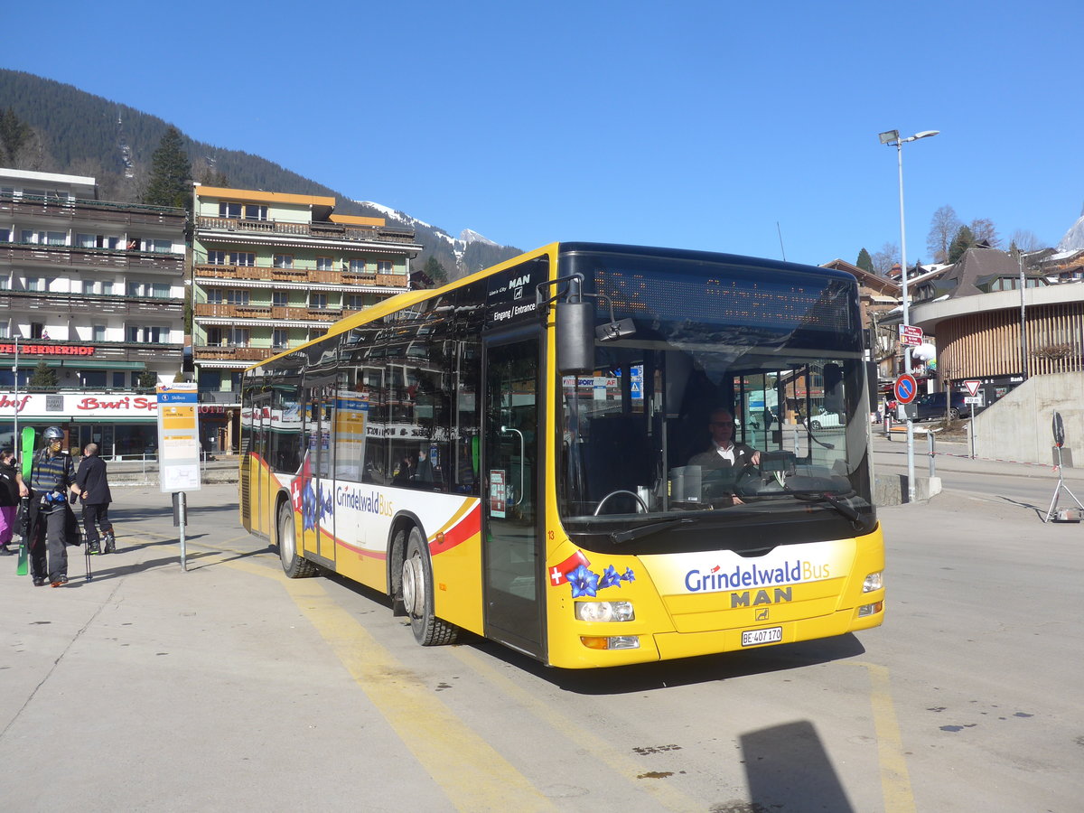 (223'883) - Grindelwaldbus, Grindelwald - Nr. 13/BE 407'170 - MAN/G�ppel am 28. Februar 2021 beim Bahnhof Gindelwald