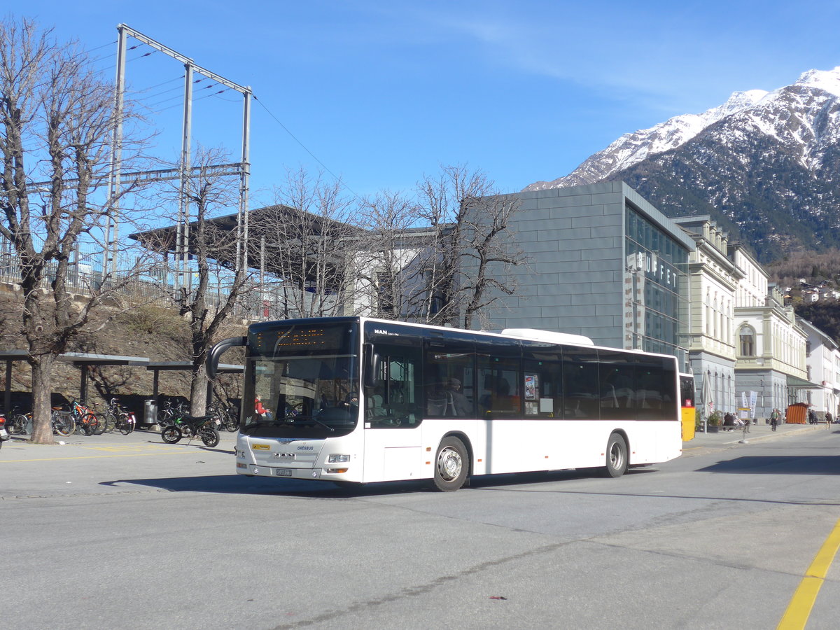 (223'910) - PostAuto Wallis - VS 449'117 - MAN am 2. M�rz 2021 beim Bahnhof Brig