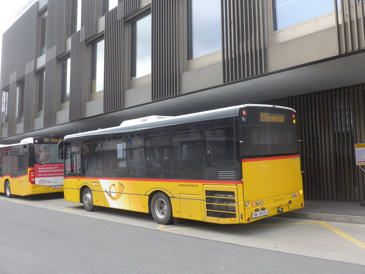 (224'420) - PostAuto Zentralschweiz - NW 26'676 - Solaris am 27. M�rz 2021 beim Bahnhof Stansstad