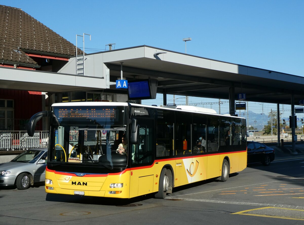 (229'800) - Lienert&Ehrler, Einsiedeln - SZ 110'233 - MAN (ex Schuler, Feusisberg) am 23. Oktober 2021 beim Bahnhof Pf�ffikon