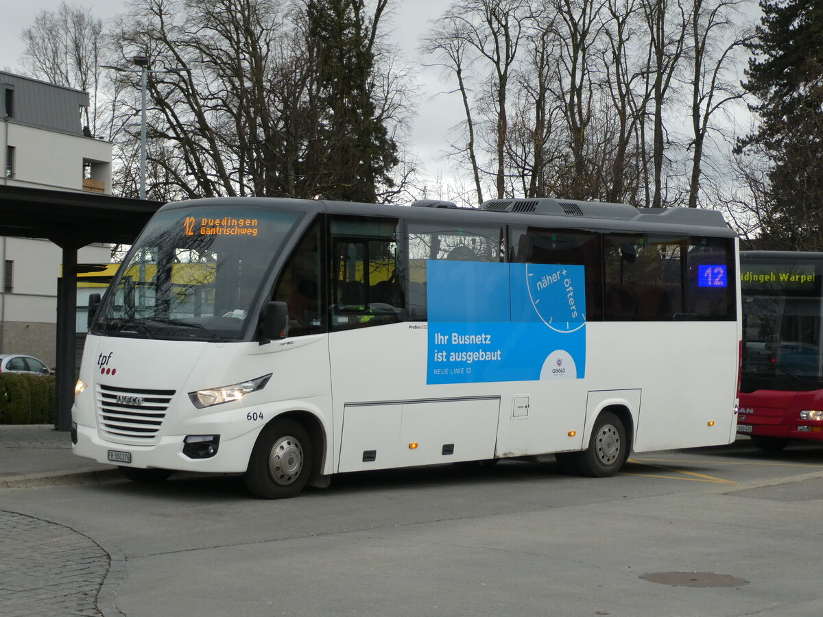 (232'732) - TPF Fribourg - Nr. 604/FR 300'276 - Iveco/ProBus am 6. Februar 2022 beim Bahnhof D�dingen