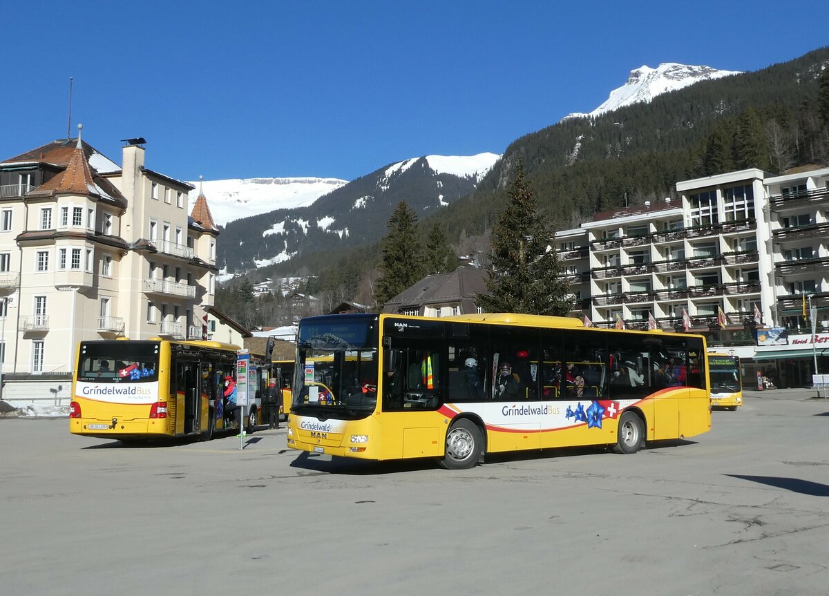 (233'249) - Grindelwaldbus, Grindelwald - Nr. 24/BE 364'408 - MAN/G�ppel am 27. Februar 2022 beim Bahnhof Grindelwald