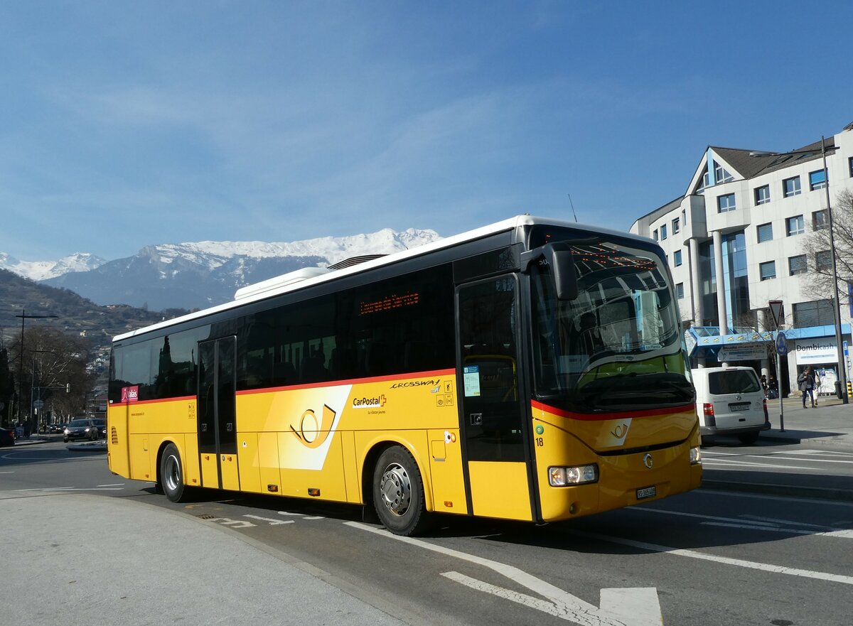 (233'456) - PostAuto Wallis - Nr. 18/VS 365'408 - Irisbus am 7. M�rz 2022 beim Bahnhof Sion