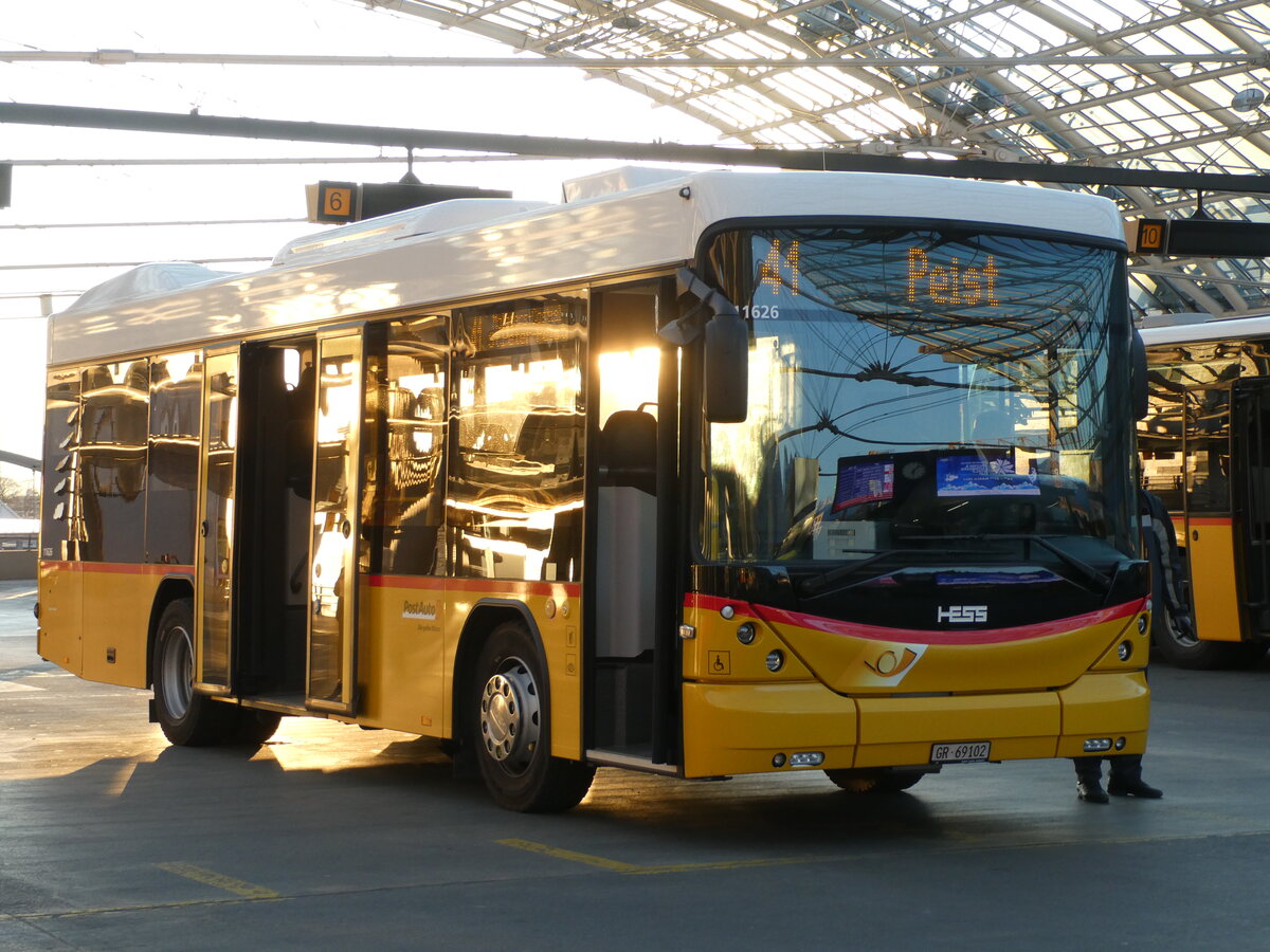 (233'732) - PostAuto Graub�nden - GR 69'102 - Scania/Hess am 10. M�rz 2022 in Chur, Postautostation