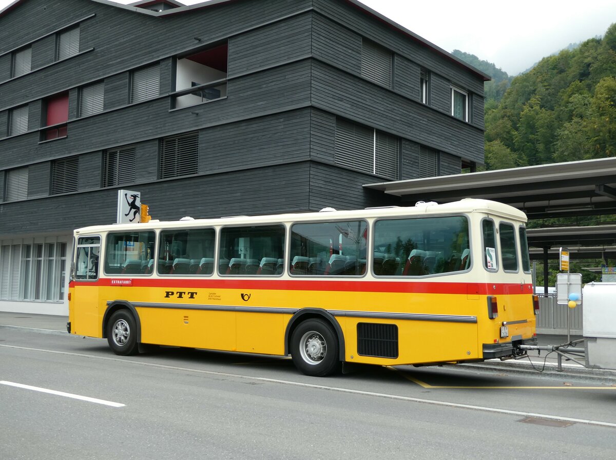(239'814) - Schmid, Th�rishaus - BE 26'206 - Saurer/T�scher (ex P 24'244) am 28. August 2022 beim Bahnhof Giswil