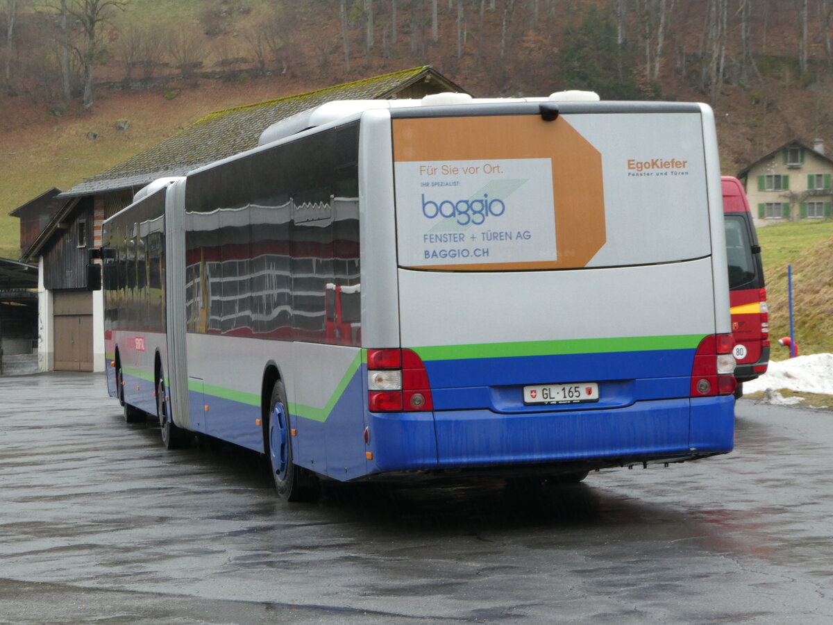 (244'436) - AS Engi - Nr. 15/GL 165 - MAN (ex TPL Lugano Nr. 438; ex Ryffel, Uster; ex Stucki, Porrentruy/PID 5433; ex SBC Chur Nr. 91) am 3. Januar 2023 in Engi, Garage