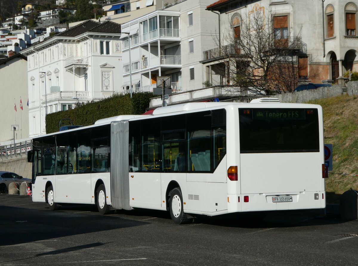 (245'895) - Intertours, Domdidier - Nr. 659/FR 300'659 - Mercedes (ex Nr. 205; ex VZO Gr�ningen Nr. 29) am 7. Februar 2023 beim Bahnhof Locarno