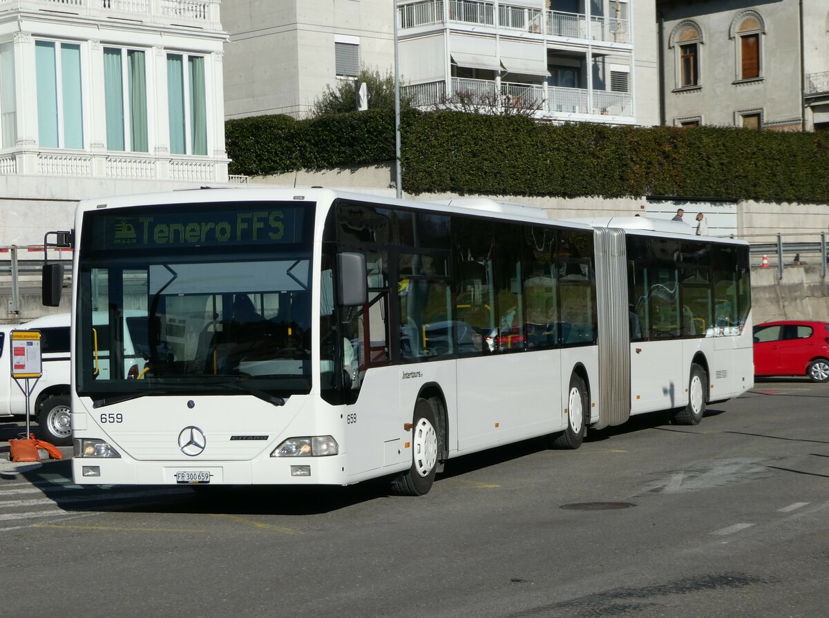 (245'954) - Intertours, Domdidier - Nr. 659/FR 300'659 - Mercedes (ex Nr. 205; ex VZO Gr�ningen Nr. 29) am 7. Februar 2023 beim Bahnhof Locarno