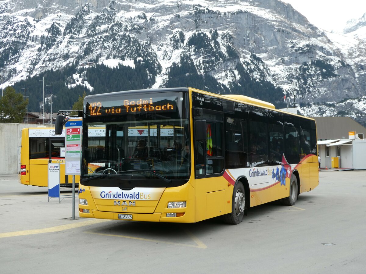 (246'228) - Grindelwaldbus, Grindelwald - Nr. 19/BE 363'305 - MAN/G�ppel am 17. Februar 2023 beim Bahnhof Grindelwald