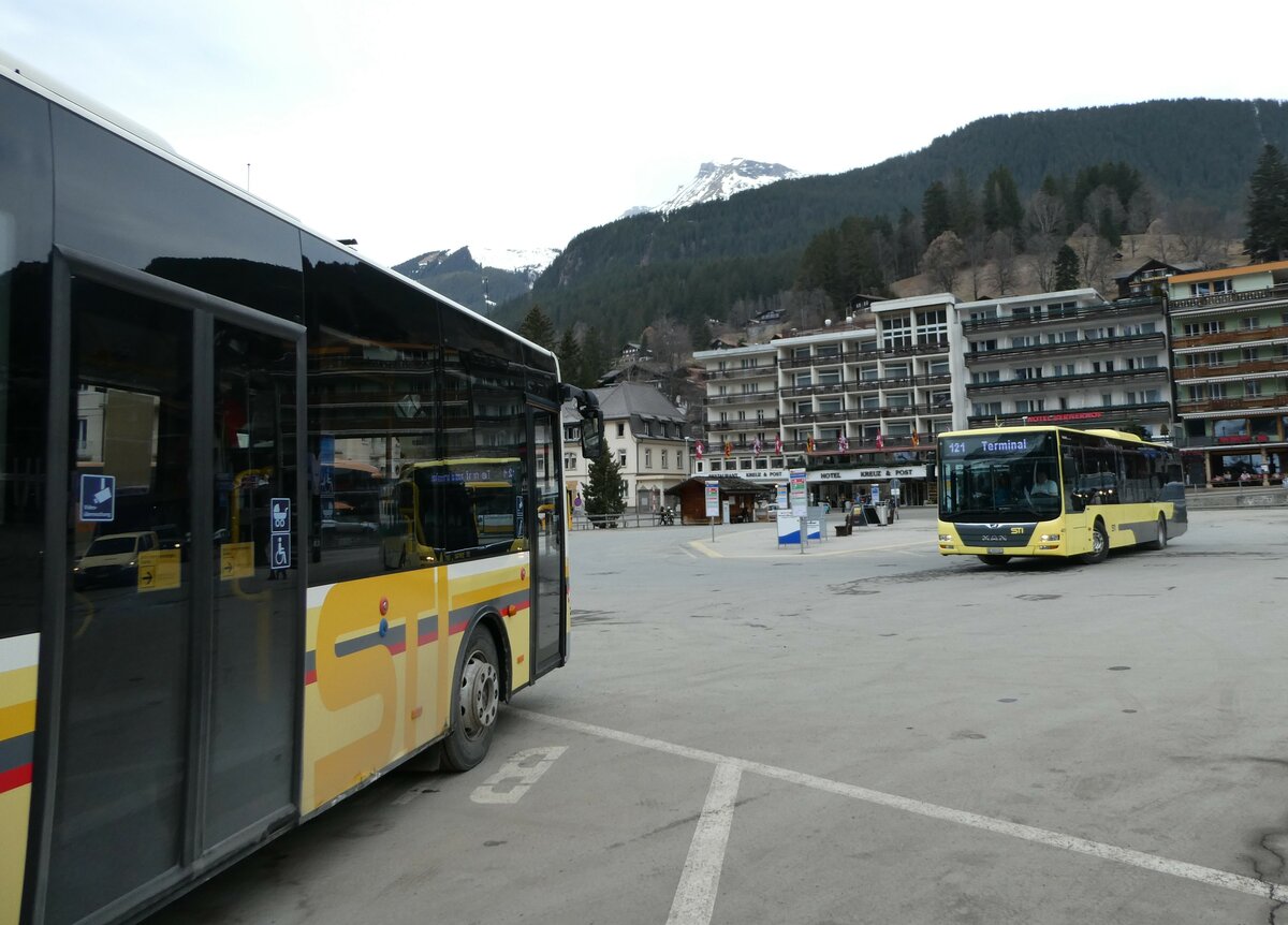 (246'231) - STI Thun - Nr. 401/BE 849'401 - MAN am 17. Februar 2023 beim Bahnhof Grindelwald (Einsatz Grindelwaldbus)