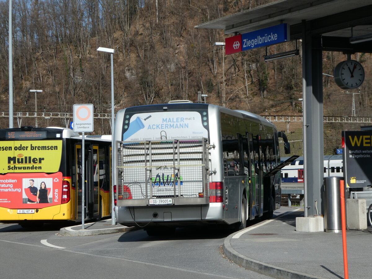 (246'470) - AWA Amden - Nr. 5/SG 39'005 - MAN (ex ATT Cadenazzo; ex St. Gallerbus, St. Gallen; ex Vorf�hrfahrzeug) am 24. Februar 2023 beim Bahnhof Ziegelbr�cke