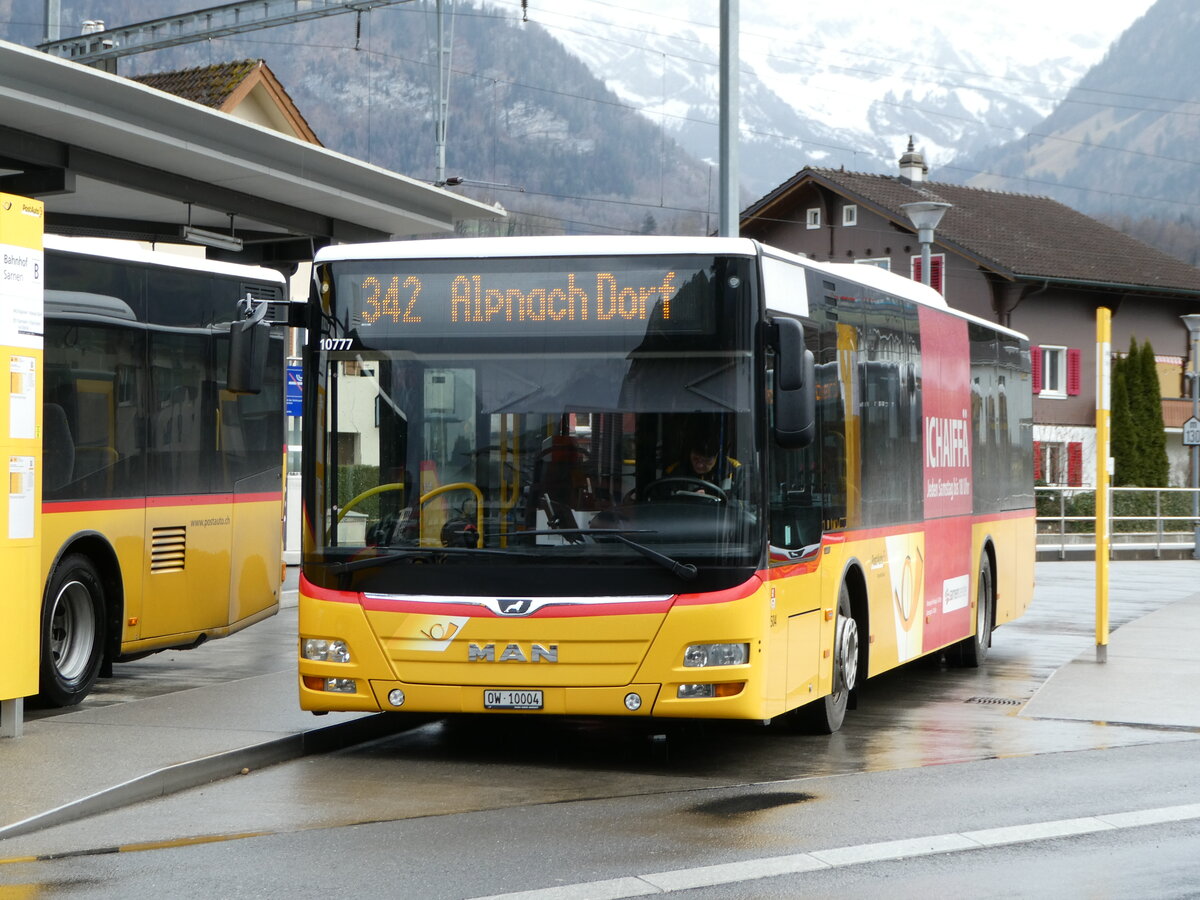 (247'130) - PostAuto Zentralschweiz - Nr. 504/OW 10'004/PID 10'777 - MAN (ex Nr. 10; ex Dillier, Sarnen Nr. 10) am 10. M�rz 2023 beim Bahnhof Sarnen
