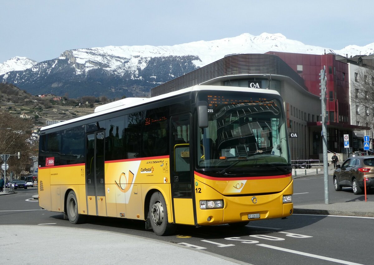 (247'241) - PostAuto Wallis - Nr. 12/VS 106'000/PID 5255 - Irisbus (ex Theytaz, Sion) am 16. M�rz 2023 beim Bahnhof Sion