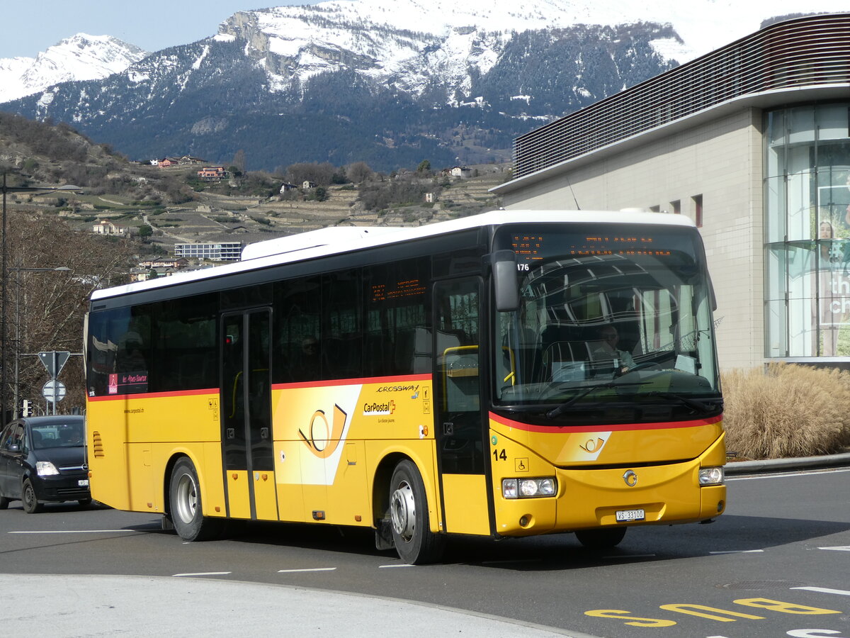 (247'243) - PostAuto Wallis - Nr. 14/VS 33'100/PID 5176 - Irisbus (ex TMR Martigny Nr. 136) am 16. M�rz 2023 beim Bahnhof Sion 