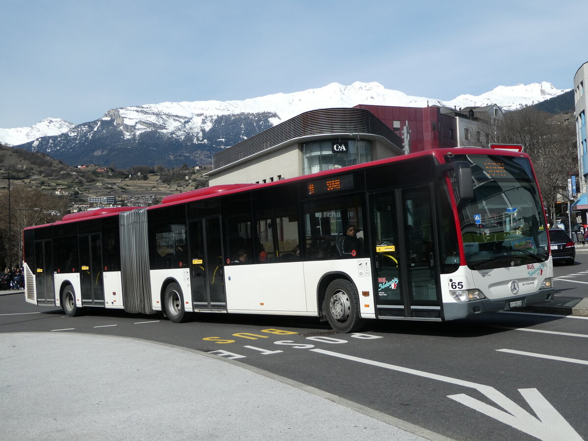 (247'257) - PostAuto Wallis - Nr. 65/VS 186'400/PID 5315 - Mercedes (ex Lathion, Sion Nr. 65) am 16. M�rz 2023 beim Bahnhof Sion