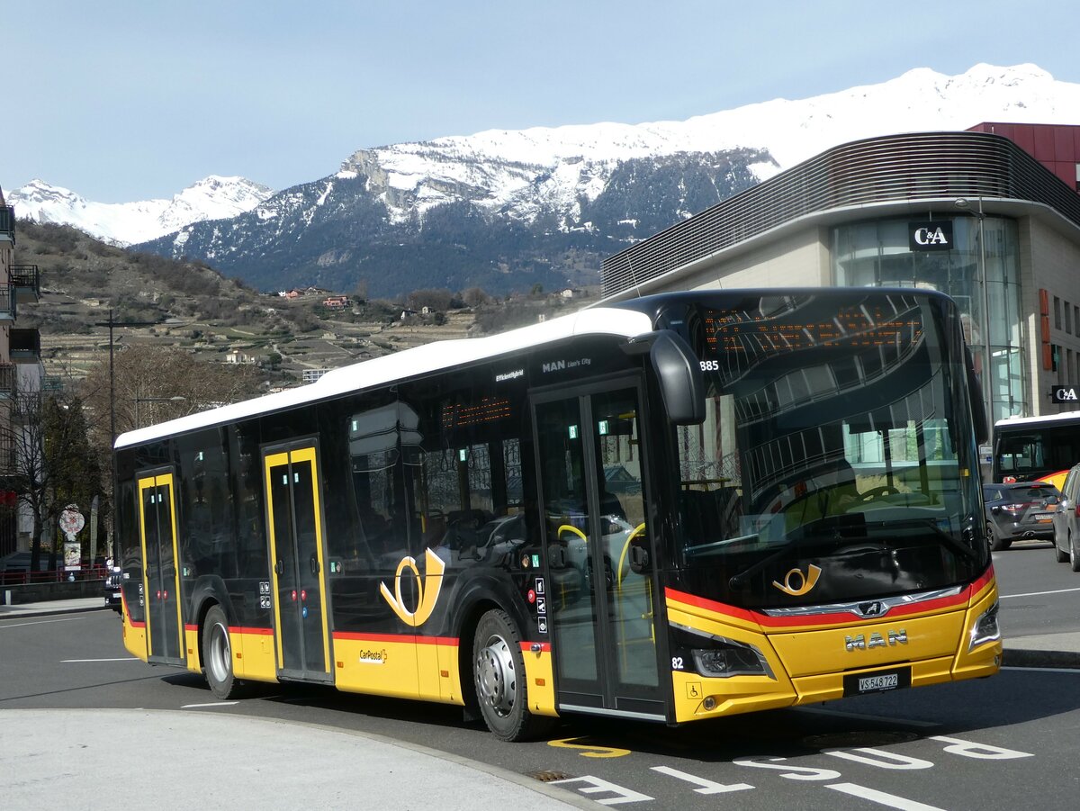 (247'261) - PostAuto Wallis  Nr. 82/VS 548'722/PID 11'885 - MAN am 16. M�rz 2023 beim Bahnhof Sion
