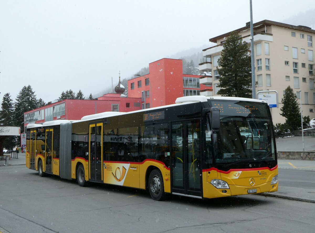 (248'630) - PostAuto Graub�nden - GR 56'450/PID 11'590 - Mercedes am 15. April 2023 beim Bahnhof Davos Dorf