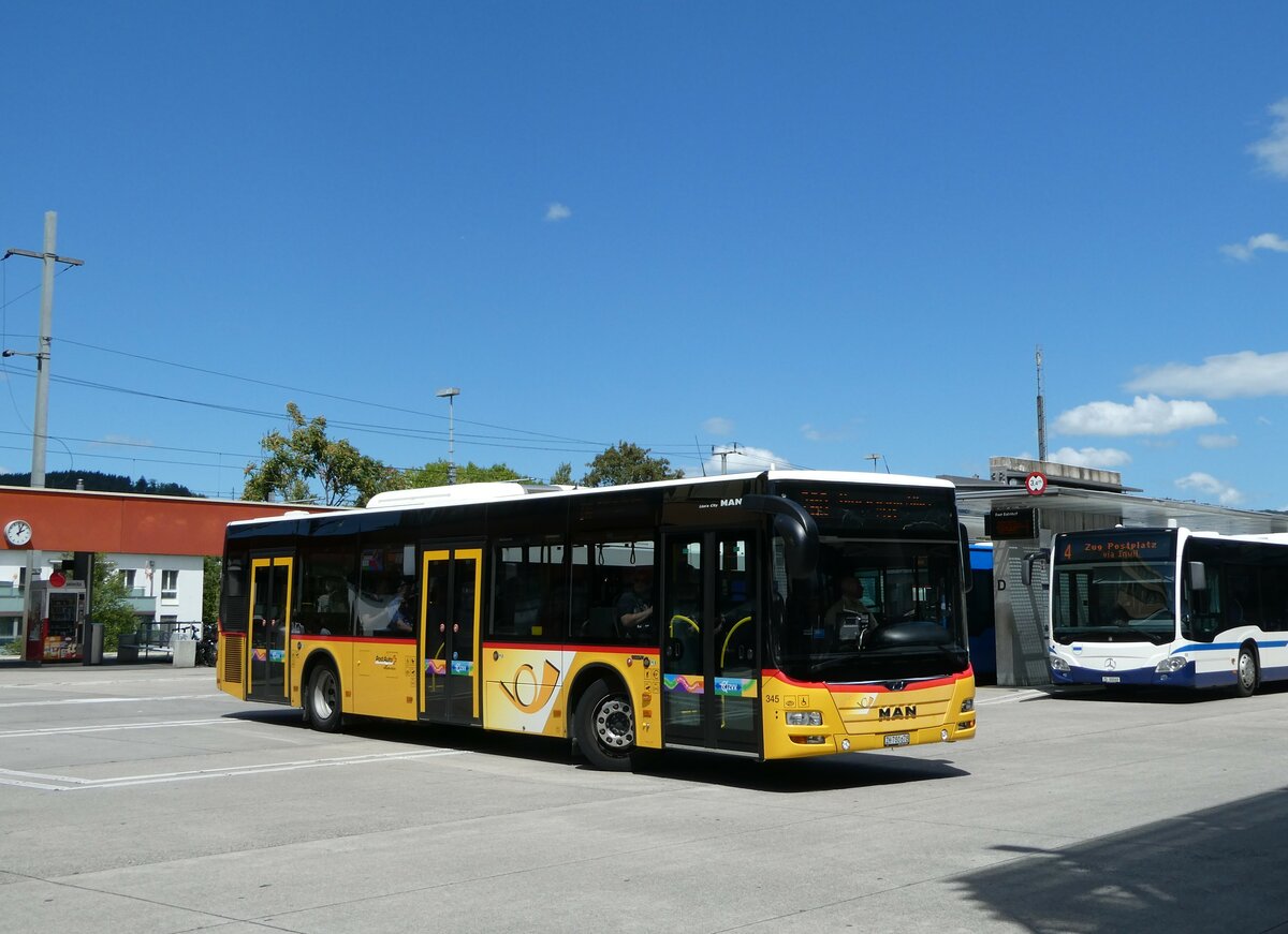 (253'350) - PostAuto Z�rich - Nr. 345/ZH 780'678/PID 10'886 - MAN am 3. August 2023 beim Bahnhof Baar