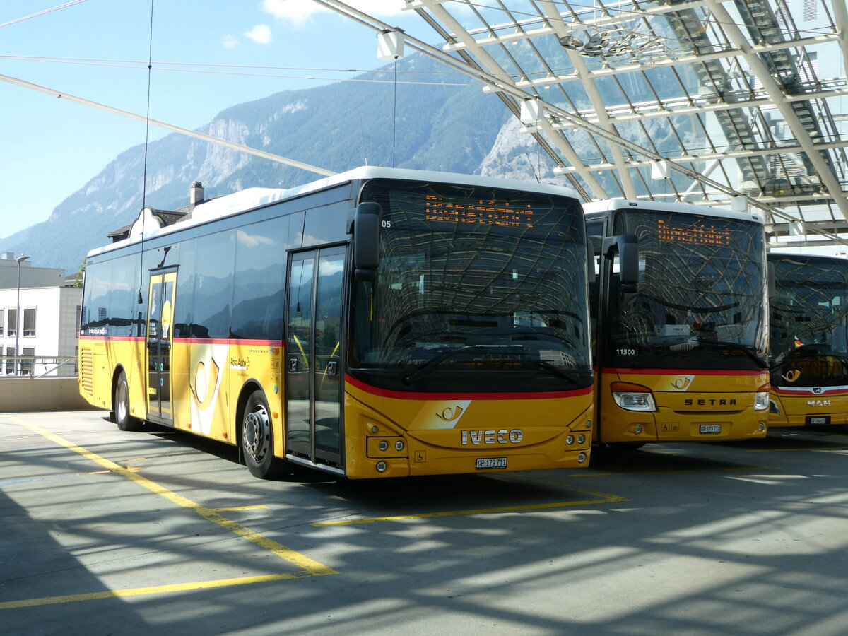 (254'922) - PostAuto Graub�nden - GR 179'711/PID 11'405 - Iveco am 8. September 2023 in Chur, Postautostation