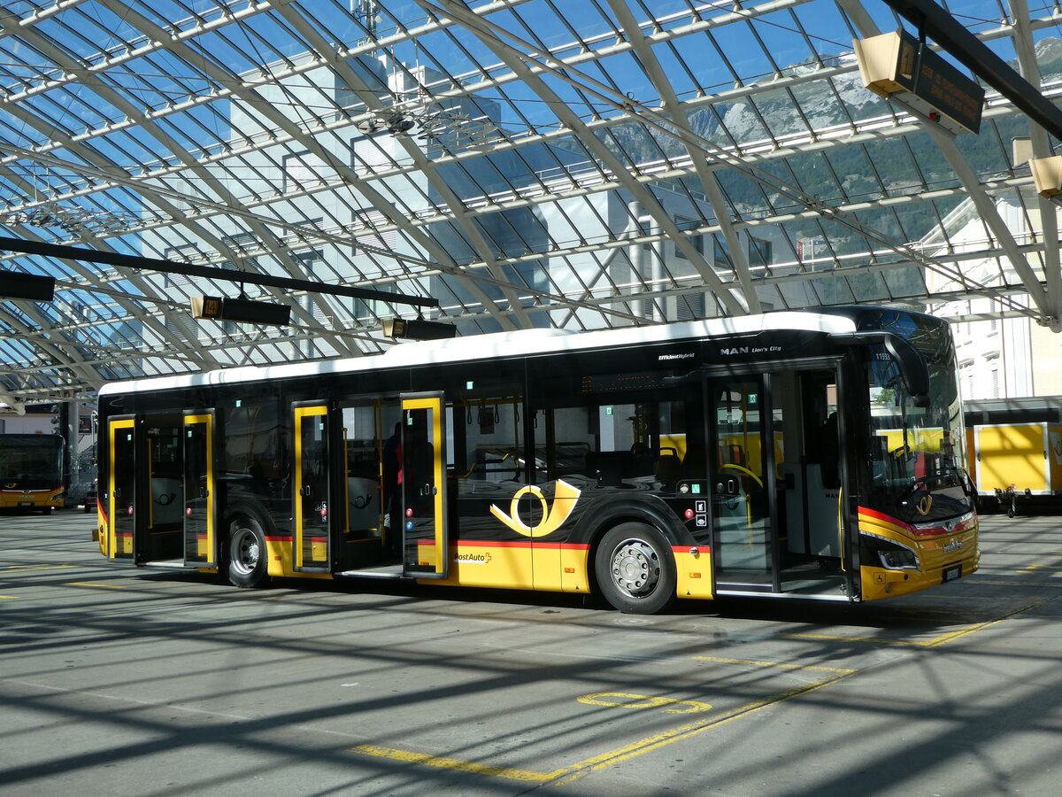 (255'599) - PostAuto Graub�nden - GR 184'617/PID 11'933 - MAN am 26. September 2023 in Chur, Postautostation