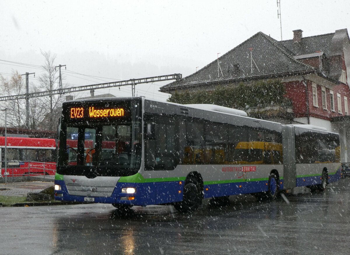 (257'293) - AS Engi - Nr. 15/GL 165 - MAN (ex TPL Lugano Nr. 438; ex Ryffel, Uster; ex Stucki, Porrentruy/PID 5433; ex SBC Chur Nr. 91) am 28. November 2023 beim Bahnhof Appenzell