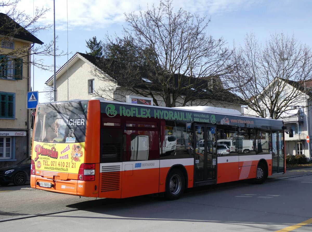 (259'327) - BOTG Amriswil - Nr. 404/TG 70'015 - MAN (ex Nr. 9) am 15. Februar 2024 beim Bahnhof Amriswil
