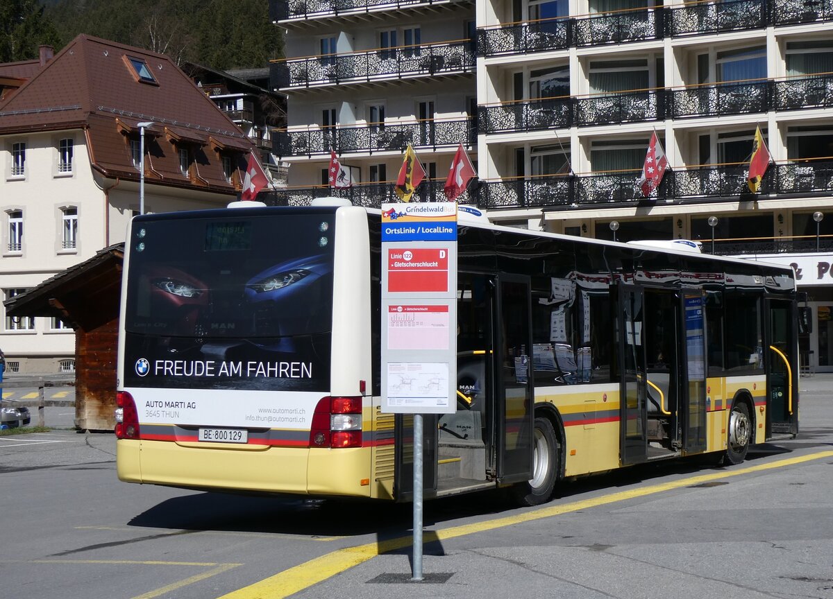 (260'513) - STI Thun - Nr. 129/BE 800'129 - MAN am 19. M�rz 2024 beim Bahnhof Grindelwald