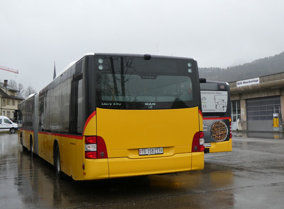 (260'900) - PostAuto Ostschweiz - TG 158'213/PID 4818 - MAN (ex PostAuto Graub�nden; ex PostAuto Ostschweiz SZ 68'458 + SZ 44'040; ex Kistler, Reichenburg) am 1. April 2024 in Nesslau, Garage