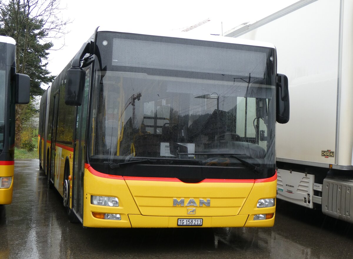 (260'905) - PostAuto Ostschweiz - TG 158'213/PID 4818 - MAN (ex PostAuto Graub�nden; ex PostAuto Ostschweiz SZ 68'458 + SZ 44'040; ex Kistler, Reichenburg) am 1. April 2024 in Nesslau, Garage