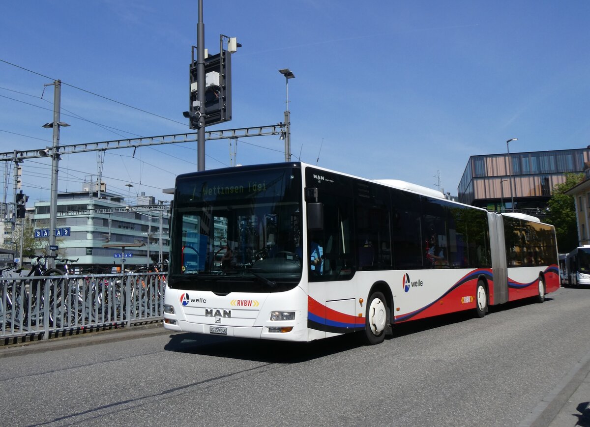 (261'168) - Twerenbold, Baden - Nr. 306/AG 549'046 - MAN am 12. April 2024 beim Bahnhof Baden