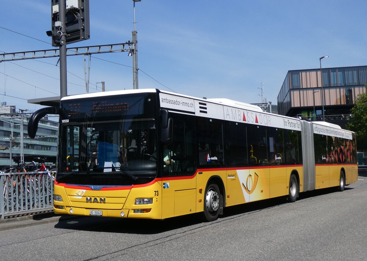 (261'175) - Steffen, Remetschwil - Nr. 73/AG 35'043/PID 10'550 - MAN am 12. April 2024 beim Bahnhof Baden