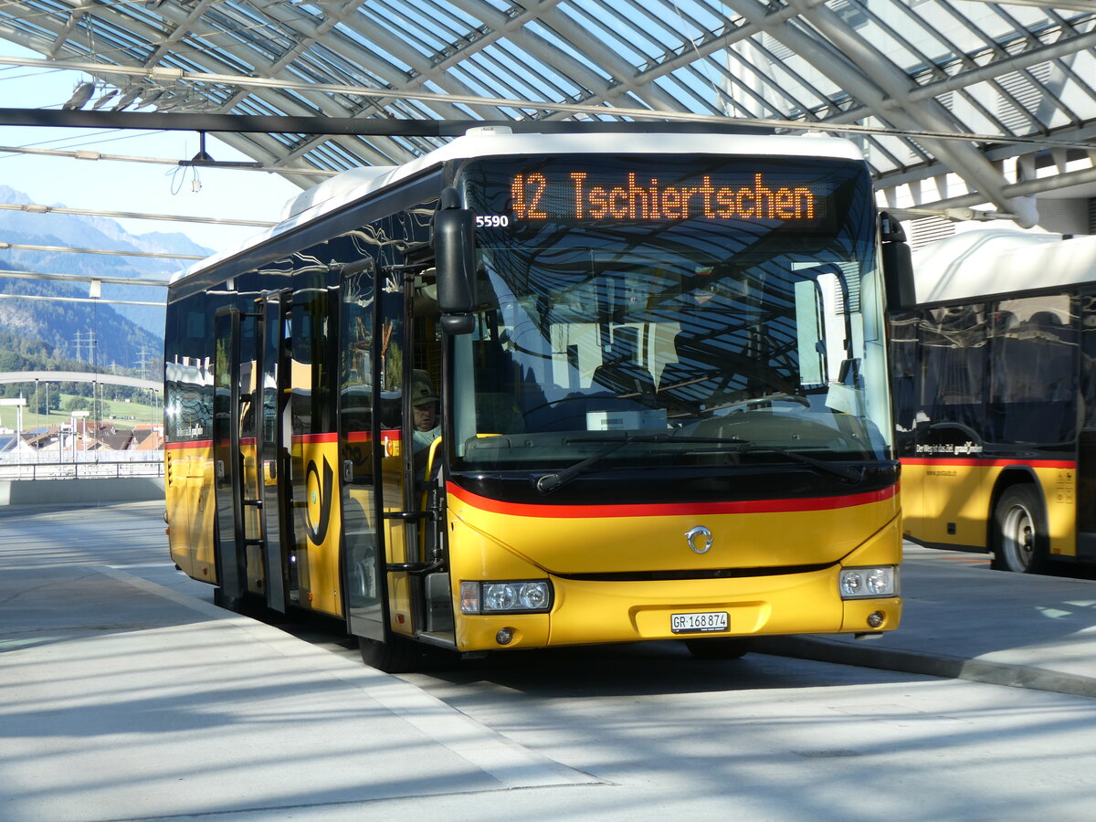 (266'204) - PostAuto Graub�nden - GR 168'874/PID 5590 - Irisbus am 27. August 2024 in Chur, Postautostation