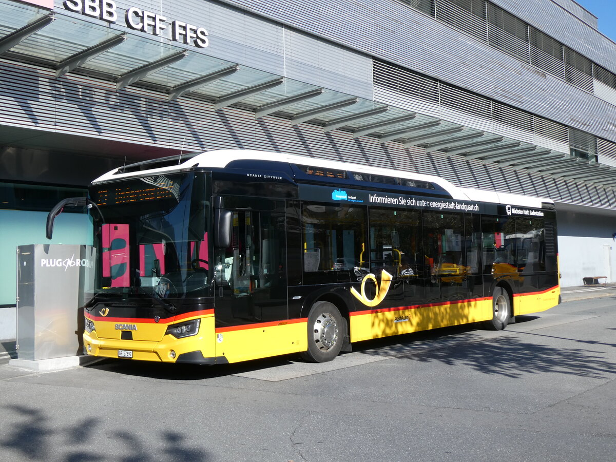 (266'214) - D�nser, Trimmis - GR 27'692/PID 11'894 - eScania (ex GR 166'037) am 27. August 2024 beim Bahnhof Landquart