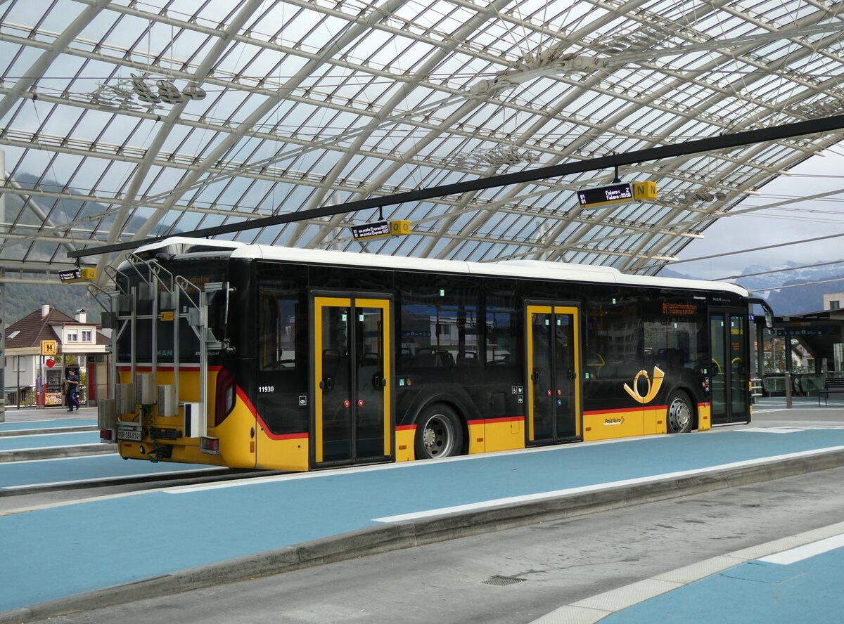 (267'847) - PostAuto Graub�nden - GR 184'614/PID 11'930 - MAN am 8. Oktober 2024 in Chur, Postautostation