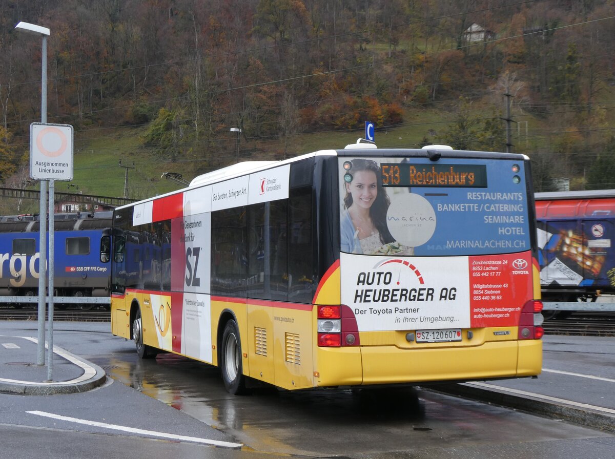 (269'263) - PostAuto Ostschweiz - SZ 120'607/PID 10'490 - MAN (ex Kistler, Reichenburg) am 19. November 2024 beim Bahnhof Ziegelbr�cke