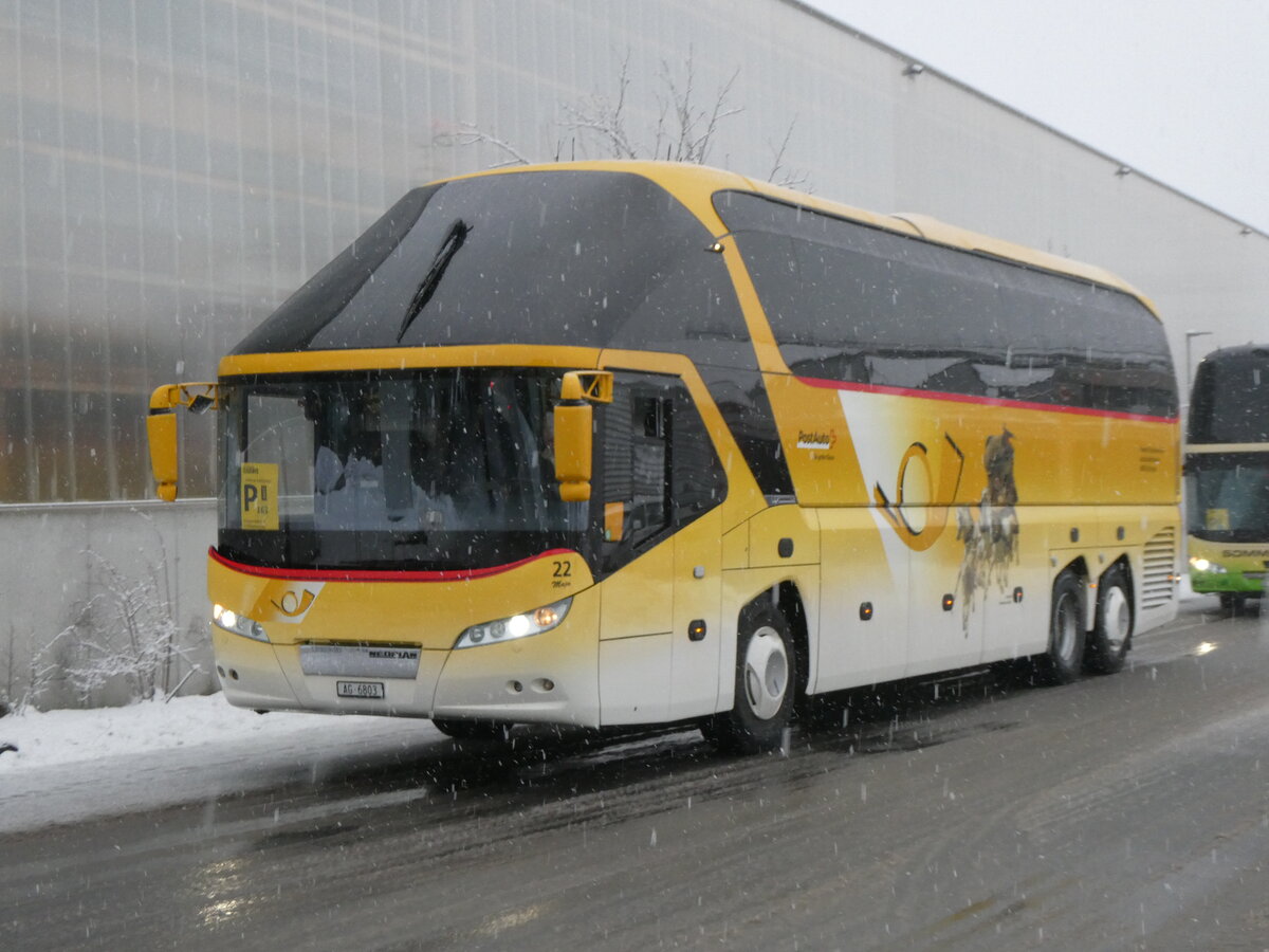 (270'861) - Tschannen, Zofingen - Nr. 22/AG 6803/PID 4706 - Neoplan (ex PostAuto Graub�nden) am 11. Januar 2025 beim Bahnhof Frutigen