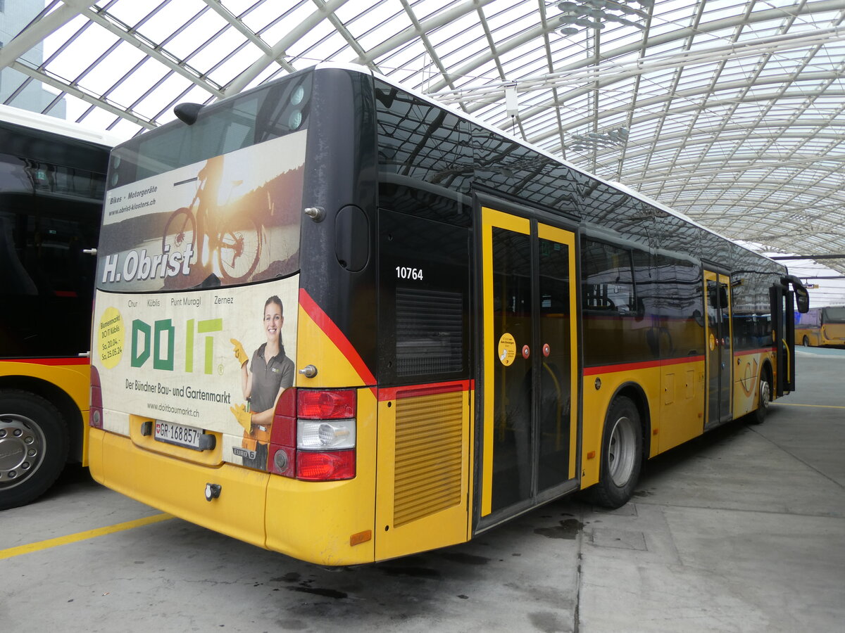 (271'937) - PostAuto Graub�nden - GR 168'857/PID 10'764 - MAN am 14. Februar 2025 in Chur, Postautostation