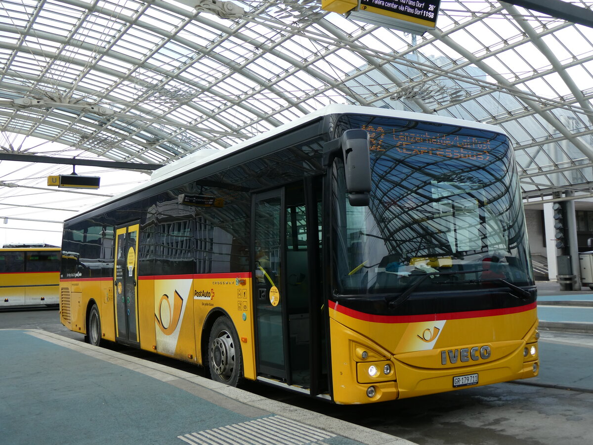 (272'014) - PostAuto Graub�nden - GR 179'711/PID 11'405 - Iveco am 14. Februar 2025 in Chur, Postautostation