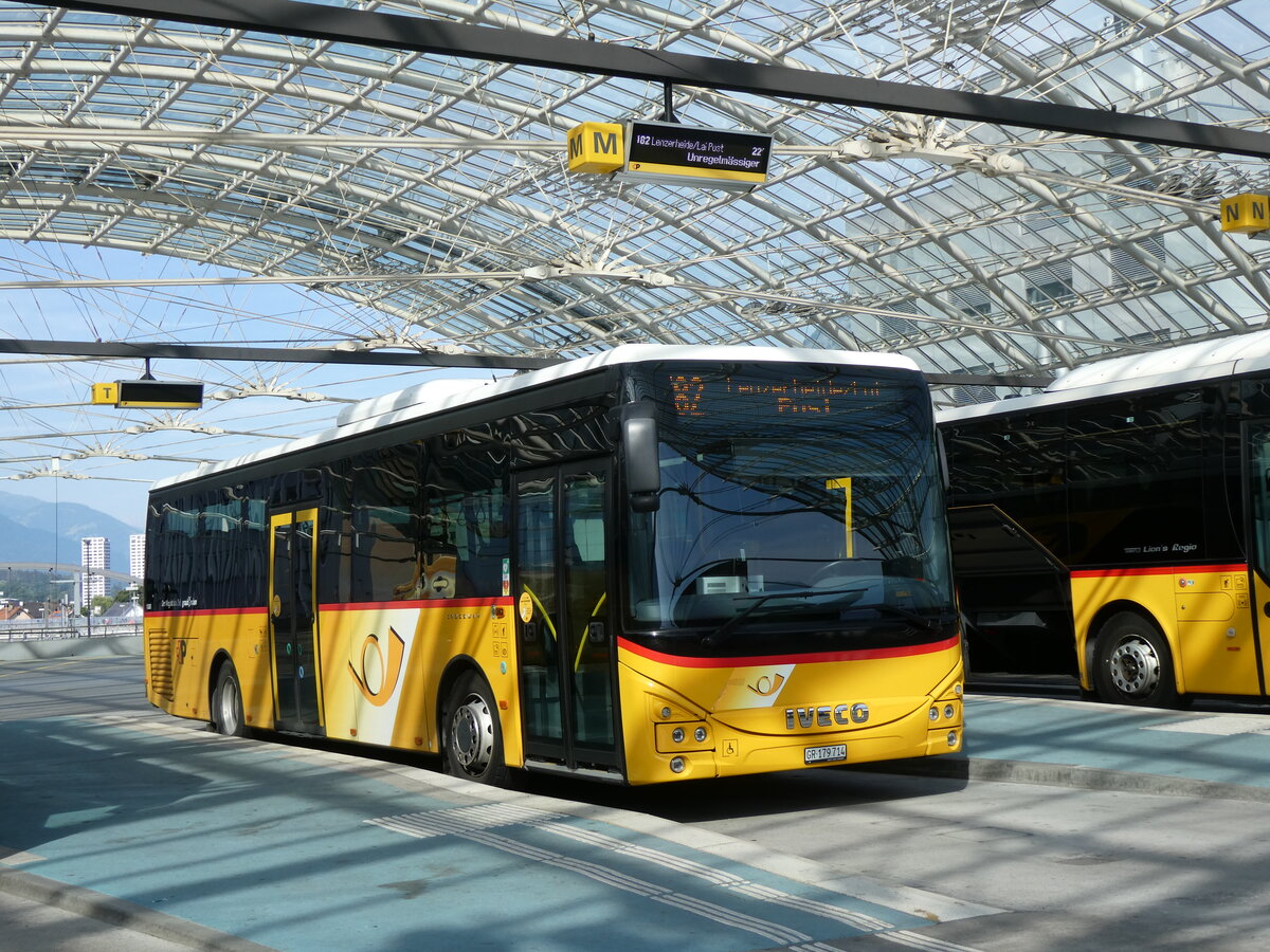 (276'876) - PostAuto Graub�nden - GR 179'714/PID 11'283 - Iveco am 18. Juni 2025 in Chur, Postautostation