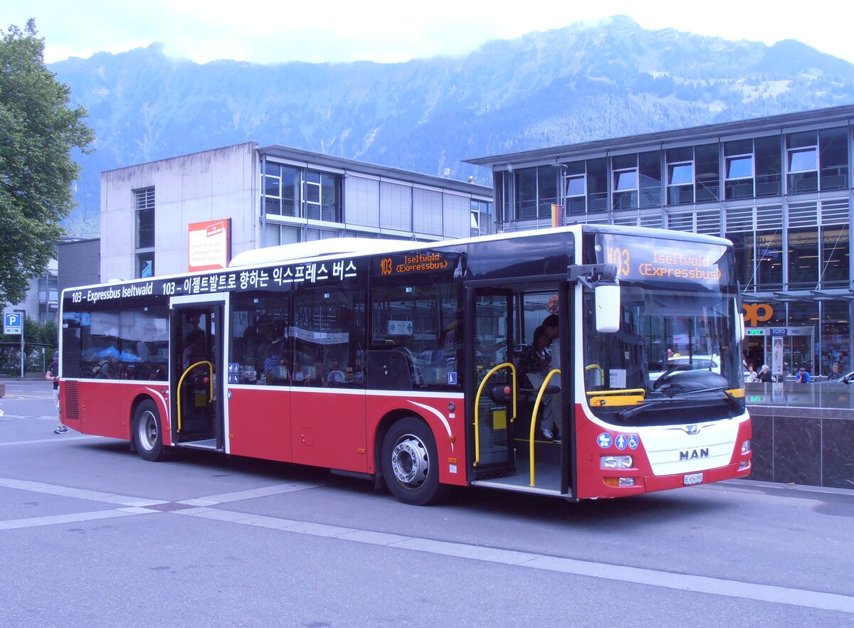 (277'876) - PostAuto Bern - BE 654'090/PID 12'339 - MAN (ex Dr. Richard, A-Wien Nr. 1419) am 15. Juli 2025 beim Bahnhof Interlaken Ost