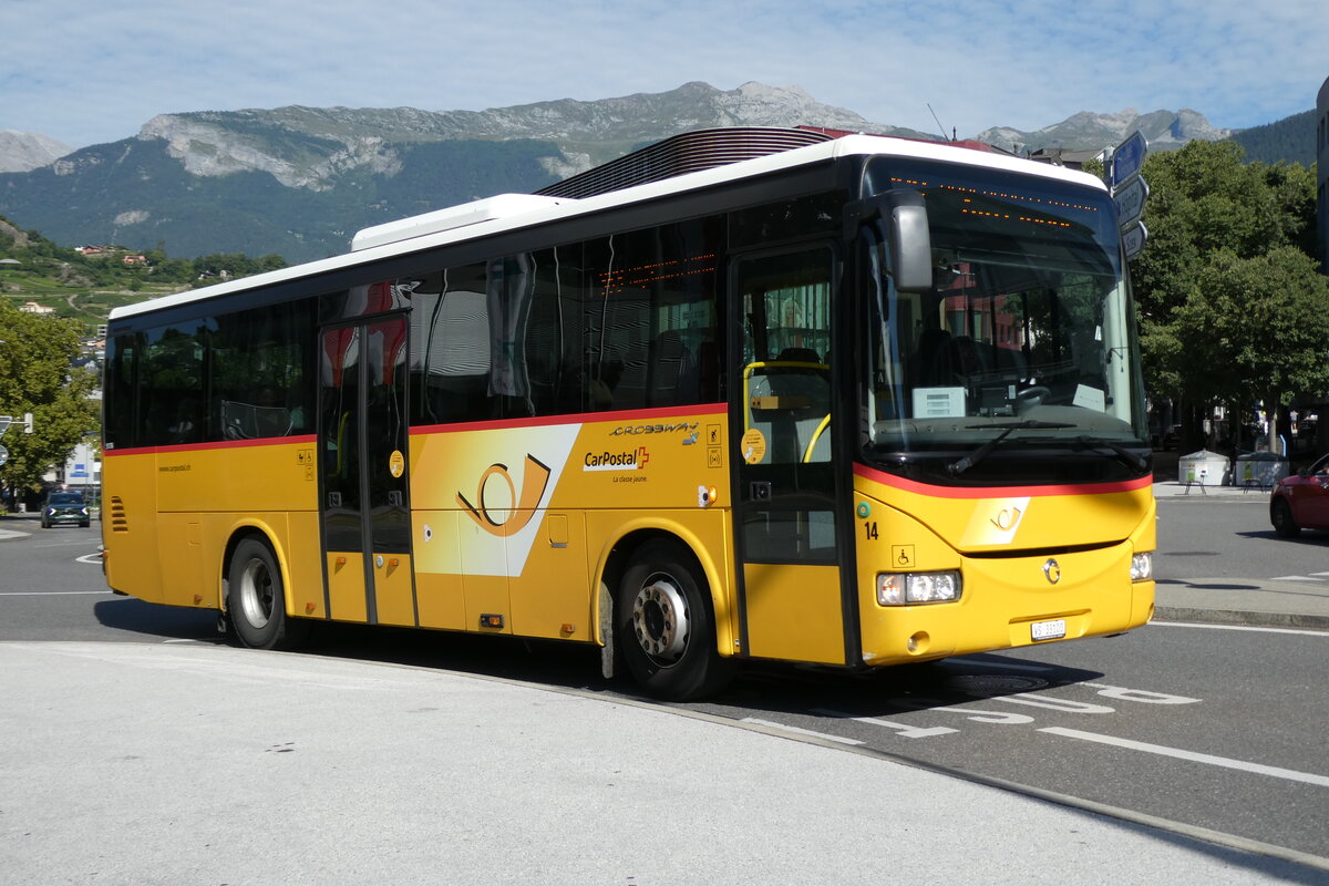 (278'528) - PostAuto Wallis - Nr. 14/VS 33'100/PID 5176 - Irisbus (ex TMR Martigny Nr. 136) am 5. August 2025 beim Bahnhof Sion