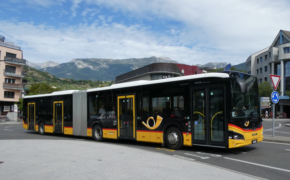 (278'538) - PostAuto Wallis - Nr. 84/VS 548'724/PID 11'887 - MAN am 5. August 2025 beim Bahnhof Sion