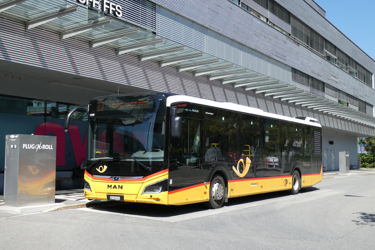 (278'625) - PostAuto Graub�nden - GR 184'614/PID 11'930 - MAN am 8. August 2025 beim Bahnhof Landquart