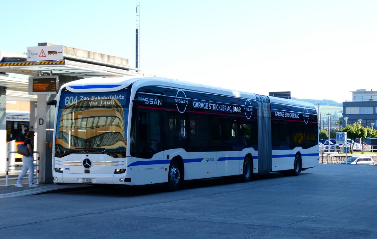 (279'396) - ZVB Zug - Nr. 83/ZG 88'083 - eMercedes am 26. August 2025 beim Bahnhof Baar