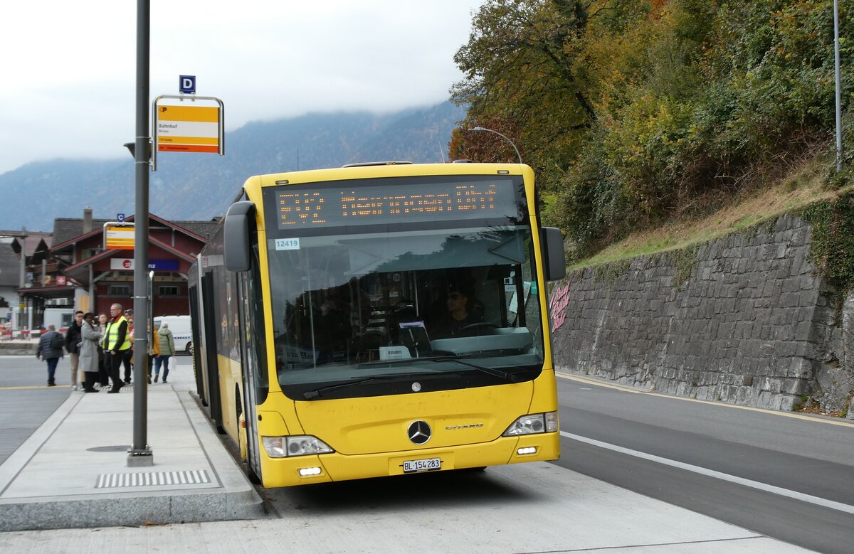 (281'563) - PostAuto Nordschweiz - BL 154'283(PID 12'419 - Mercedes (ex AAGL Liestal Nr. 98) am 16. Oktober 2025 beim Bahnhof Brienz 
