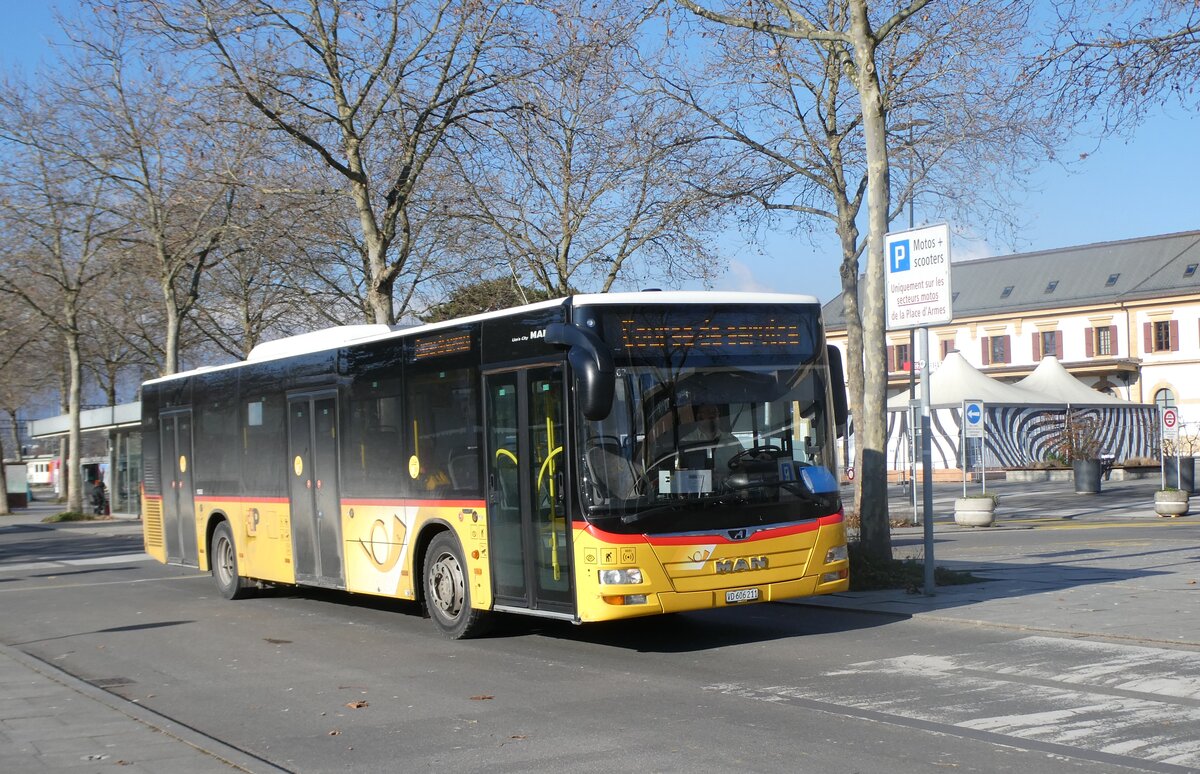 (282'538) - CarPostal Ouest - VD 606'211/PID 10'262 - MAN (ex JU 51'287; ex Nr. 22) am 22. November 2025 beim Bahnhof Yverdon